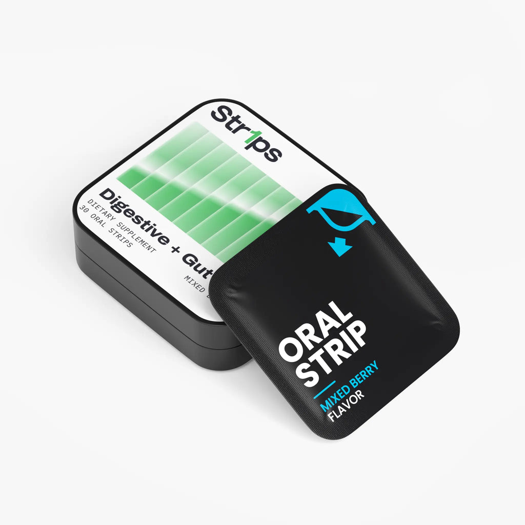 A pack of Strips oral strip digestive + gut support tablets in a black tin, with a black single-use oral strip packet labeled 'ORAL STRIP MIXED-BERRY FLAVOR' placed in front on a clean white background.