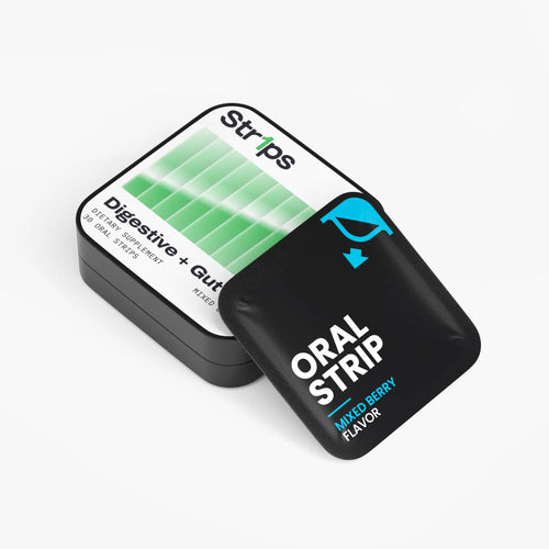 A pack of Strips oral strip digestive + gut support tablets in a black tin, with a black single-use oral strip packet labeled 'ORAL STRIP MIXED-BERRY FLAVOR' placed in front on a clean white background.
